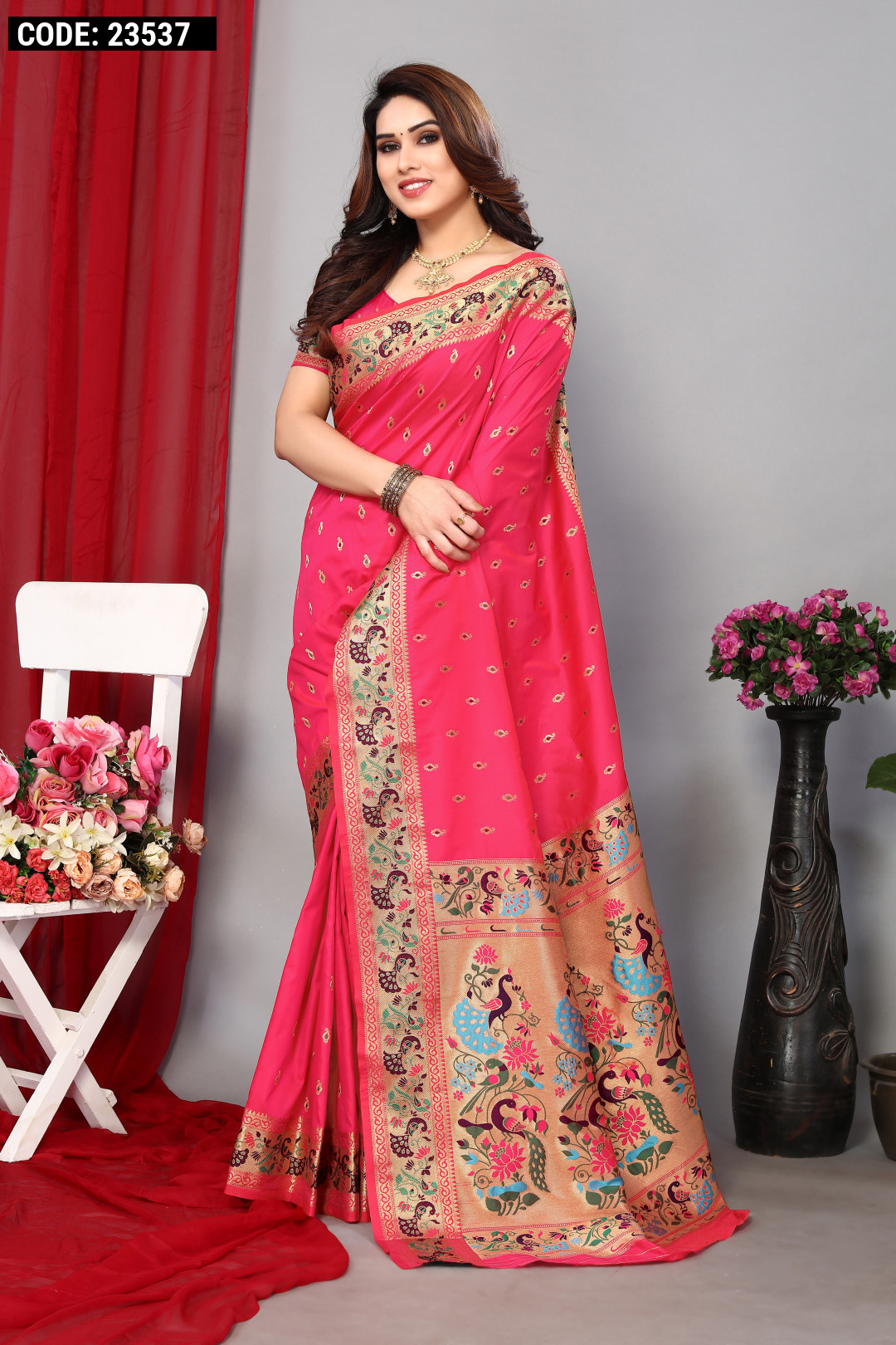 Rani pink color paithani silk saree with weaving work