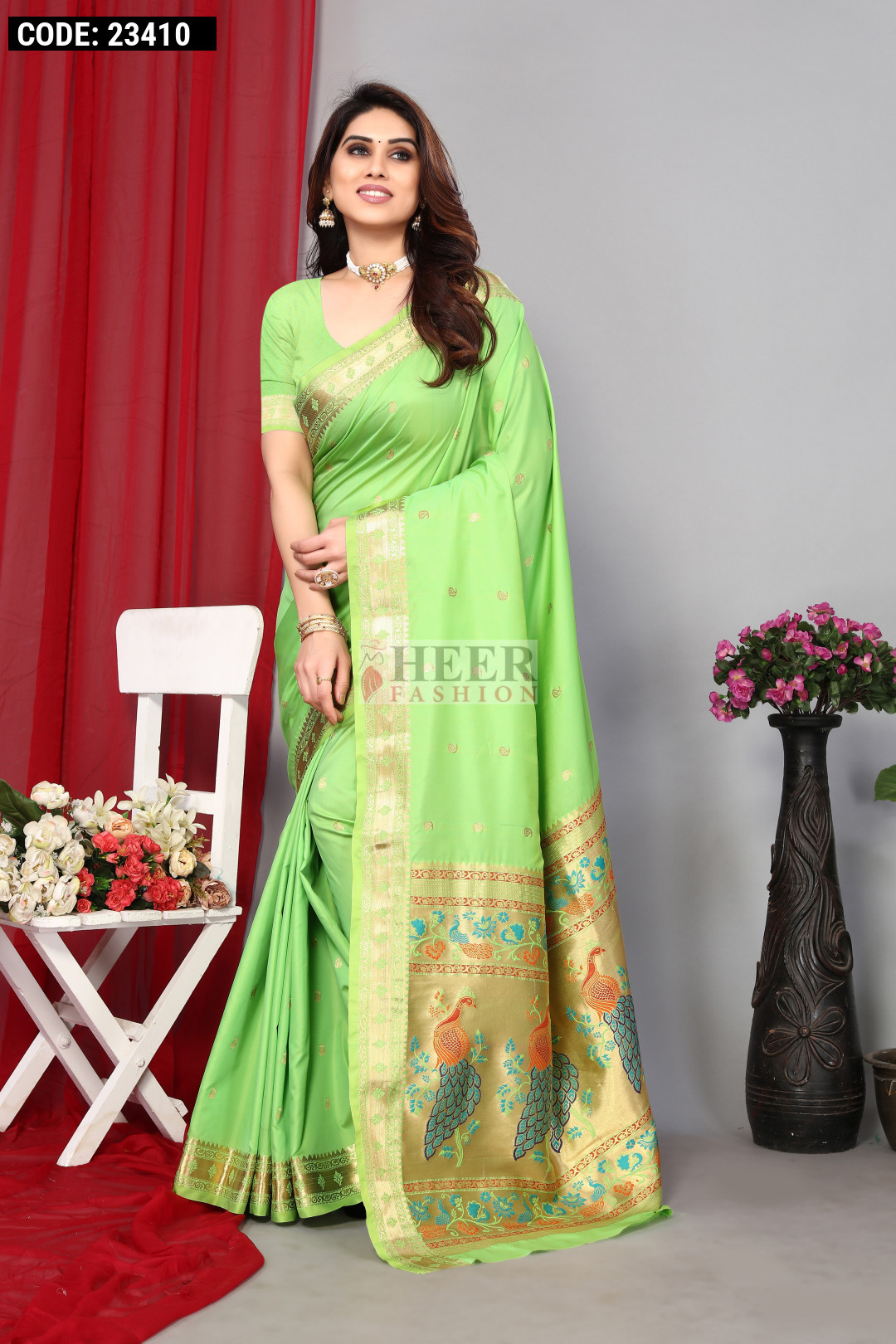 Parrot green color paithani silk saree with zari weaving work