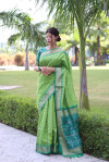 Pista green color tussar silk saree with weaving work