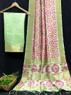 Pista green color tussar silk  saree with marigold design print work