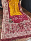 Yellow and red color bandhej silk saree with meenakari weaving work