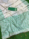 Off white and green color soft muga cotton saree with jamdani woven design