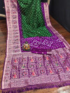 Green and magenta color bandhej silk saree meenakari weaving work
