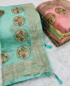 Sea green color organza silk saree with moti work