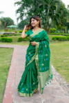 Green color soft linen silk saree with jamdani woven design