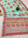Sea green color pushmina silk saree with weaving work