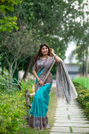 Sea green color tussar silk saree with madhubani printed work
