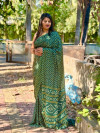 Green color dola silk saree with bandhej printed work