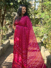 Pink color dola silk saree with bandhej printed work