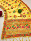 Yellow color pushmina silk saree with weaving work
