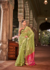Pista green color cotton silk saree with zari weaving work