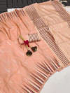 Peach color soft tussar silk saree with zari woven work