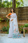 Orange color soft muga silk saree with floral weaving work