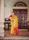 Yellow color cotton silk saree with zari weaving work