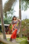 Red color tussar silk saree with madhubani printed work