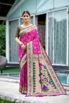 Pink color patola silk saree with zari weaving work