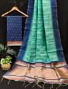 Sea green color soft handloom raw silk saree with weaving work