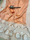 Peach color organza silk saree with embroidery work