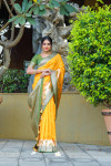 Yellow color soft banarasi silk saree with zari weaving work