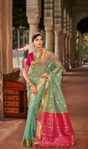 Sea green color cotton silk saree with zari weaving work