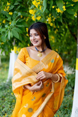 Yellow color soft linen silk saree with jamdani woven design