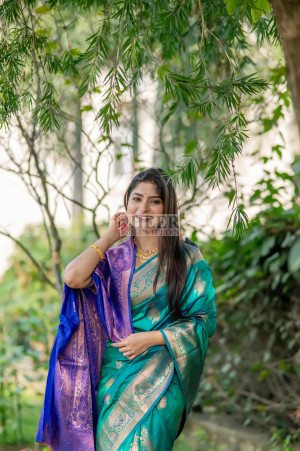 Rama green color soft banarasi silk saree with zari weaving work