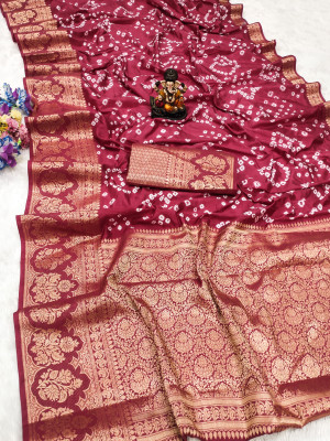 Dusty pink color bandhej silk saree with zari weaving work