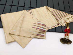 Beige color soft tussar silk saree with zari woven work