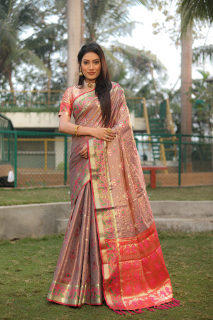 Dusty pink color soft organza silk saree with patola woven design