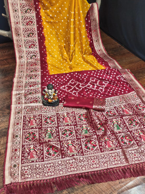 Yellow and red color bandhej silk saree with meenakari weaving work
