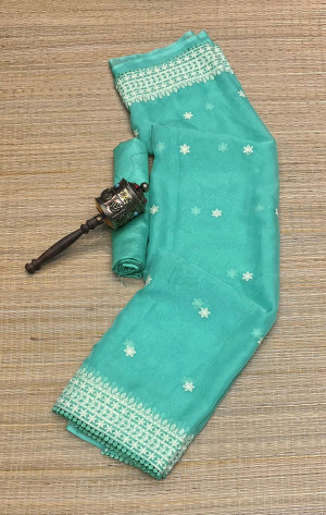 Sea green color organza silk saree with embroidery work
