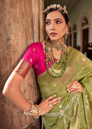 Pista green color cotton silk saree with zari weaving work