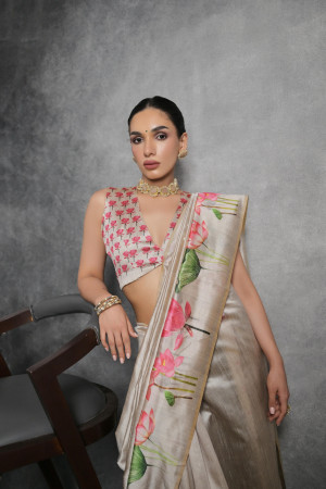 Off white color soft silk saree with printed work