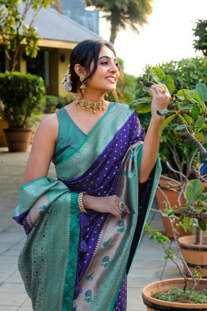 Purple color soft banarasi silk saree with zari weaving work