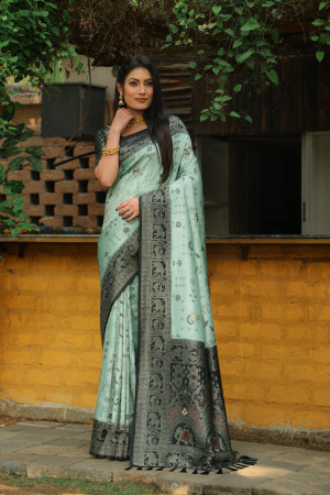 Pista green color kanjivaram silk saree with zari weaving work