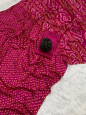 Pink color dola silk saree with bandhej printed work