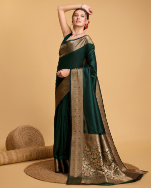 Dark green color soft kanchipuram silk saree with zari weaving work