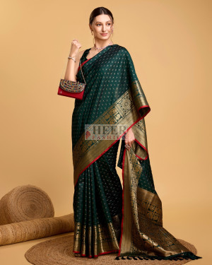 Bottle green color banarasi silk saree with zari weaving work