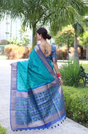 Firoji color tussar silk saree with weaving work