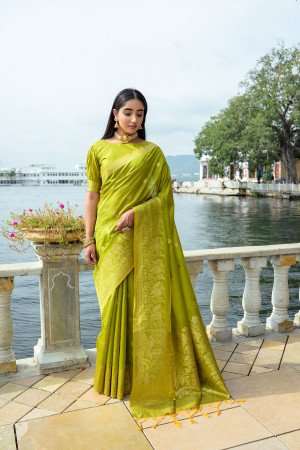 Mahendi green color soft silk saree with zari weaving work