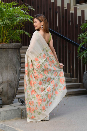 Off white color soft modal silk saree with weaving work