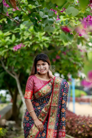 Navy blue color patola silk saree with zari weaving work