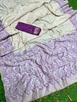 Off white and purple color soft muga silk saree with weaving work