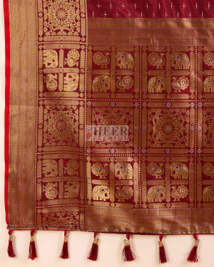 Maroon color banarasi silk saree with zari weaving work