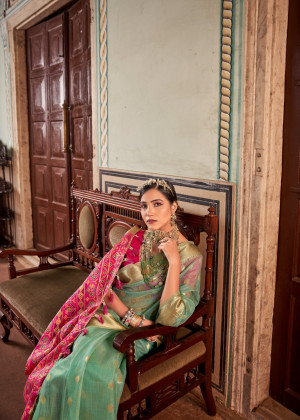 Sea green color cotton silk saree with zari weaving work