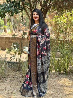 Black color dola silk saree with printed work