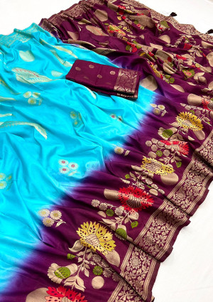 Sky blue and magenta color dola silk saree with zari weaving work