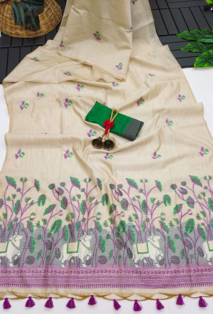 Cream and magenta color muga silk saree with weaving work