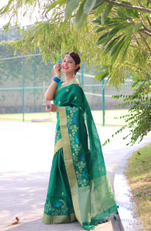 Rama green color soft linen silk saree with jamdani woven design