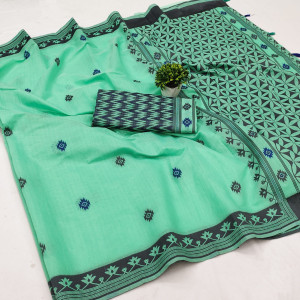 Sea green color cotton saree with weaving work